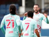 Swansea City's Conor Hourihane celebrates scoring their first goal against Luton Town in the Championship on March 13, 2021