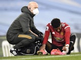 Manchester United forward Marcus Rashford gets treatment for an injury on March 7, 2021