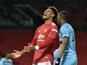 Manchester United's Marcus Rashford reacts after missing a chance against West Ham United in the Premier League on March 14, 2021