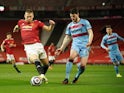 Manchester United's Scott McTominay in action with West Ham United's Declan Rice in the Premier League on March 14, 2021