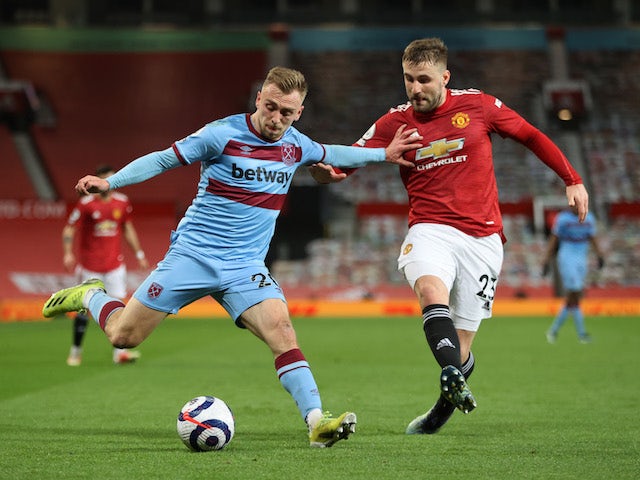 West Ham United's Jarrod Bowen in action with Manchester United's Luke Shaw in the Premier League on March 14, 2021