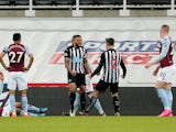 Jamaal Lascelles celebrates scoring for Newcastle United against Aston Villa in the Premier League on March 12, 2021