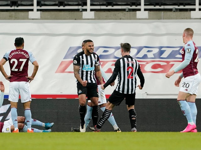 Jamaal Lascelles celebrates scoring for Newcastle United against Aston Villa in the Premier League on March 12, 2021