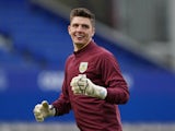 Nick Pope warms up for Burnley on March 13, 2021