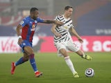 Manchester United's Nemanja Matic in action with Crystal Palace's Jordan Ayew in the Premier League on March 3, 2021
