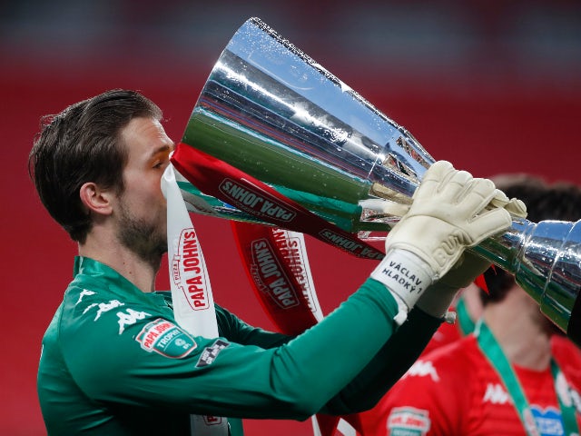 Salford's Vaclav Hladky celebrates with the EFL trophy on March 13, 2021