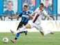 Bologna midfielder Mattias Svanberg tackling Inter Milan forward Alexis Sanchez in July 2020.
