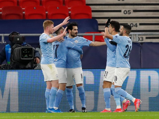 Manchester City's Ilkay Gundogan celebrates scoring their second goal against Borussia Monchengladbach in the Champions League on March 16, 2021