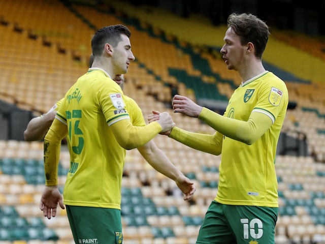 Norwich City's Kenny McLean celebrates scoring their first goal with Kieran Dowell on March 20, 2021