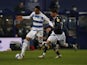Queens Park Rangers' Chris Willock in action with Millwall's George Evans in the Championship on March 17, 2021