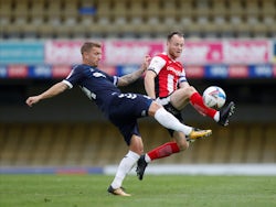 Southend United's Jason Demetriou in action with Exeter City's Jake Taylor in League Two on October 10, 2020