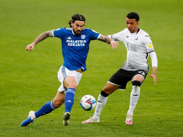 Swansea City's Morgan Whittaker in action with Cardiff City's Marlon Pack in the Championship on March 20, 2021