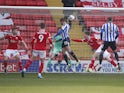 Sheffield Wednesday's Jordan Rhodes scores their first goal  against Barnsley on March 20, 2021