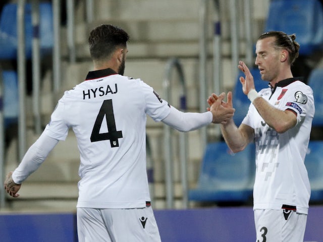 Albania's Ermir Lenjani celebrates scoring their first goal with Elseid Hysaj on March 25, 2021