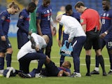 France's Anthony Martial receives medical attention on March 28, 2021