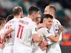 Belarus' Vitali Lisakovic celebrates scoring their fourth goal with teammates on March 27, 2021