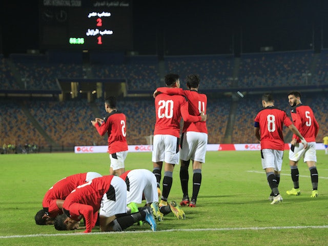 Egypt players celebrate after Ahmed Yasser Rayan scores their second goal in November 2020