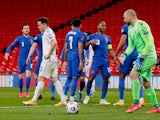 England's Raheem Sterling celebrates scoring against San Marino on March 25, 2021