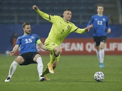 Estonia's Rauno Sappinen in action with Czech Republic's Pavel Kaderabek on March 24, 2021