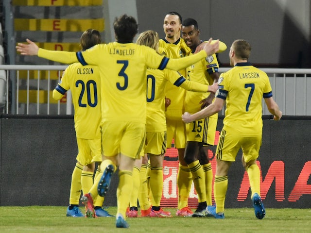 Sweden's Viktor Claesson celebrates scoring their first goal with teammates on March 28, 2021