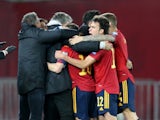 Spain players celebrate their second goal scored by Dani Olmo on March 28, 2021