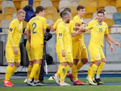 Ukraine's Junior Moraes celebrates scoring their first goal with teammates on March 28, 2021
