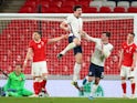 England's Harry Maguire celebrates scoring against Poland on March 31, 2021
