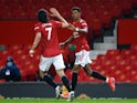 Manchester United's Marcus Rashford celebrates scoring their first goal against Brighton & Hove Albion in the Premier League on April 4, 2021