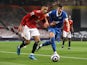 Manchester United's Mason Greenwood in action with Brighton & Hove Albion's Jakub Moder in the Premier League on April 4, 2021