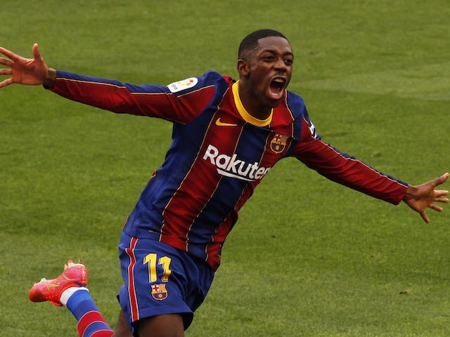 Barcelona's Ousmane Dembele celebrates scoring their first goal on February 27, 2021