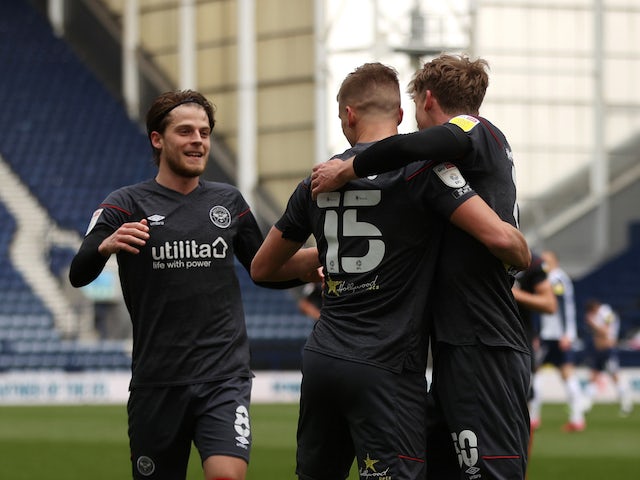 Brentford's Marcus Forss celebrates scoring their second goal with teammates on April 10, 2021