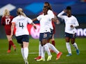  France's Viviane Asseyi celebrates scoring their second goal against England on April 9, 2021