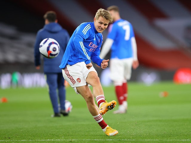 Martin Odegaard warms up for Arsenal on April 3, 2021