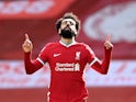 Liverpool's Mohamed Salah celebrates scoring their first goal against Aston Villa on April 10, 2021