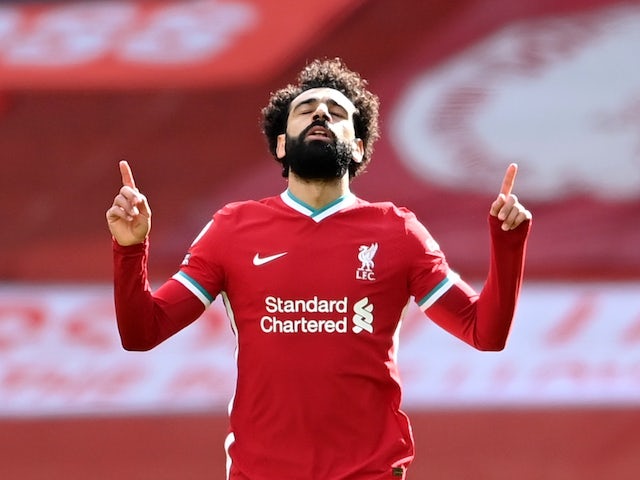 Liverpool's Mohamed Salah celebrates scoring their first goal against Aston Villa on April 10, 2021