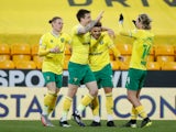 Norwich City's Jordan Hugill celebrates scoring their seventh goal against Huddersfield Town in the Championship on April 6, 2021