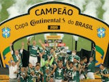 Palmeiras' Felipe Melo and teammates celebrate with the trophy after winning the Copa do Brasil on March 7, 2021