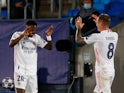  Real Madrid's Vinicius Junior celebrates scoring their first goal with Toni Kroos against Liverpool in the Champions League on April 6, 2021