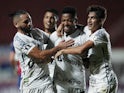 Santos' Marinho celebrates scoring their second goal with teammates on april 7, 2021