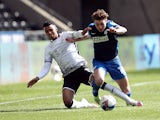 Swansea City's Morgan Whittaker in action with Preston North End's Ryan Ledson in action in the Championship on April 5, 2021