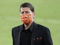 Houston Dynamo coach Tab Ramos wears a face mask during a game against the LAFC at Banc of California Stadium in October 2020