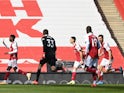 Arsenal's Eddie Nketiah celebrates scoring against Fulham in the Premier League on April 18, 2021