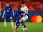 Chelsea's N'Golo Kante in action with FC Porto's Mateus Uribe in the Champions League on April 13, 2021