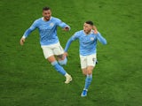 Manchester City's Phil Foden celebrates scoring against Borussia Dortmund in the Champions League on April 14, 2021