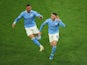 Manchester City's Phil Foden celebrates scoring against Borussia Dortmund in the Champions League on April 14, 2021