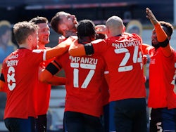 Luton Town's James Collins celebrates scoring their first goal against Watford in the Championship on April 17, 2021