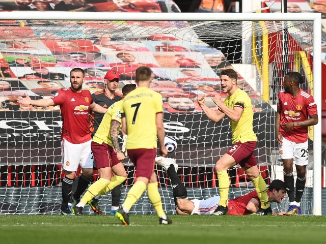 Burnley's James Tarkowski celebrates scoring their first goal against Manchester United in the Premier League on April 18, 2021