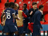 Paris Saint-Germain's Neymar celebrates after the match against Bayern Munich with Mauricio Pochettino in the Champions League on April 13, 2021