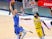 Dallas Mavericks center Kristaps Porzingis dunks past Los Angeles Lakers forward Anthony Davis on April 23, 2021