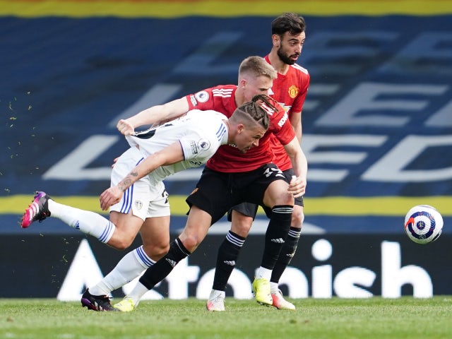 Leeds United's Kalvin Phillips in action with Manchester United's Scott McTominay in the Premier League on April 25, 2021